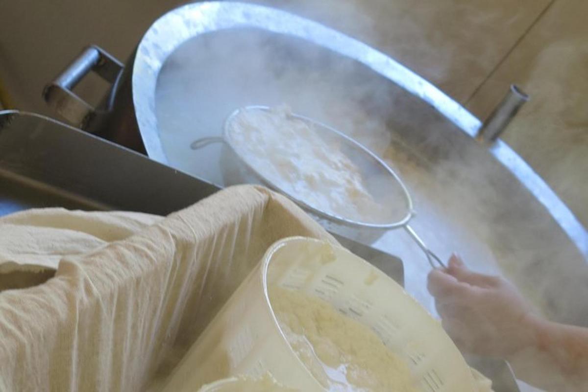 a person is cooking food on a table