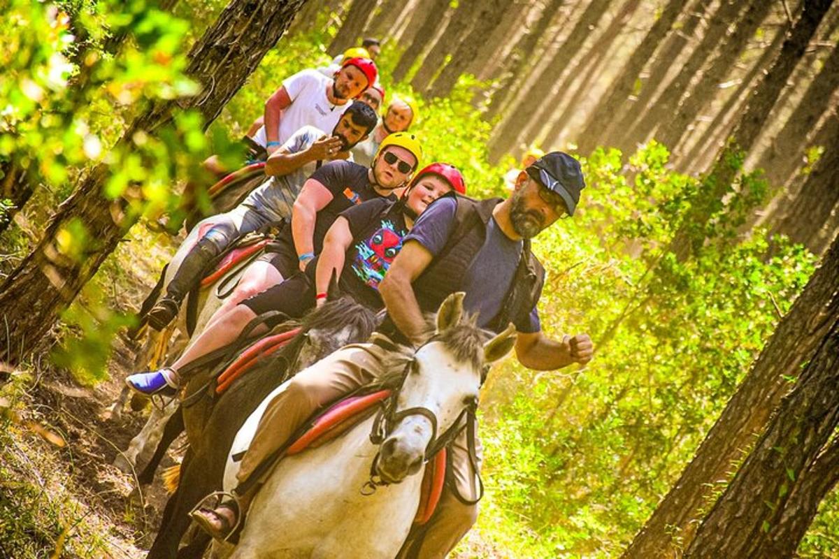 a group of people riding on the back of a horse