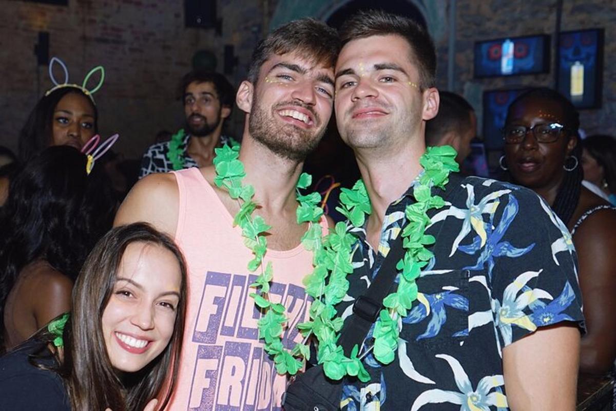 a group of people posing for a picture at a party