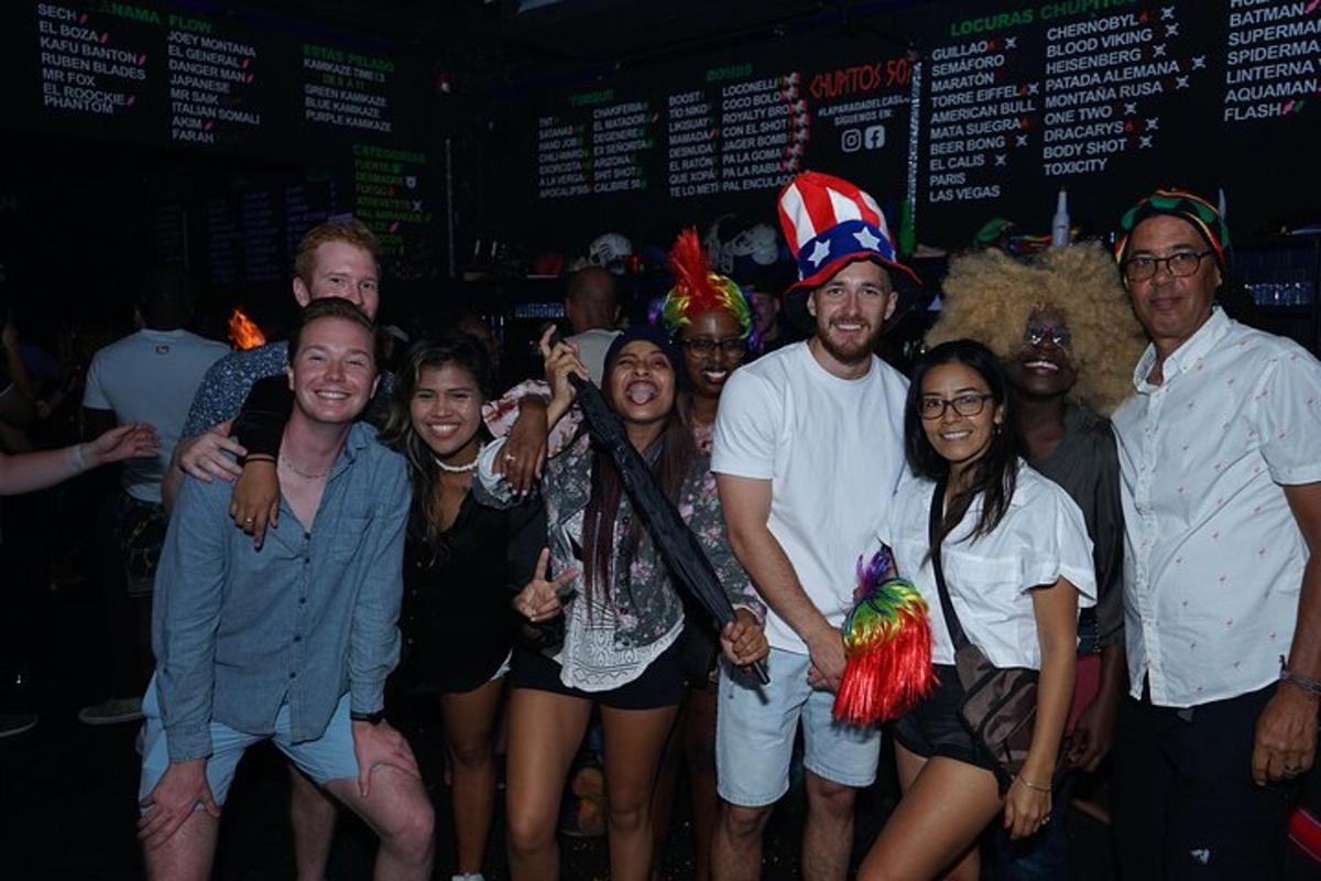 a group of people posing for a picture at a party