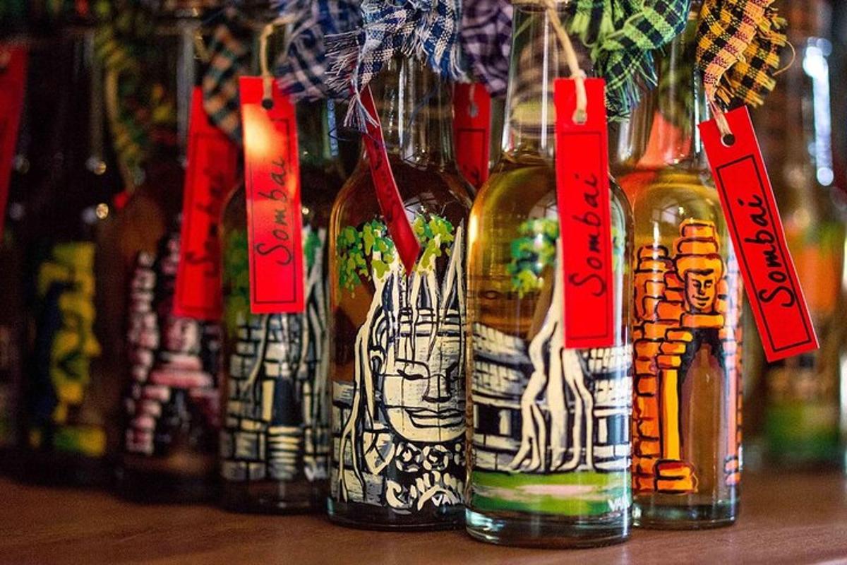 a group of bottles with tags on them on a table