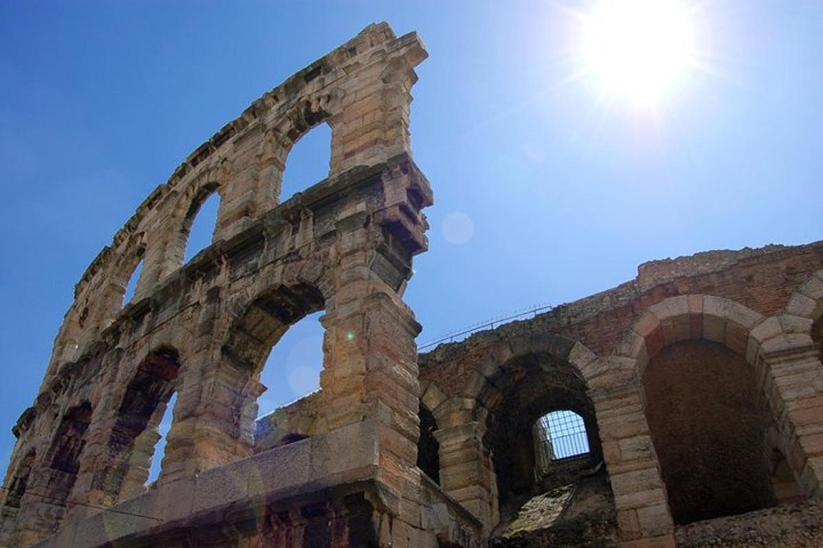 an old building with three arches on top of it