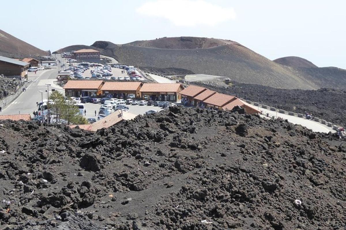 a town on top of a hill with a mountain