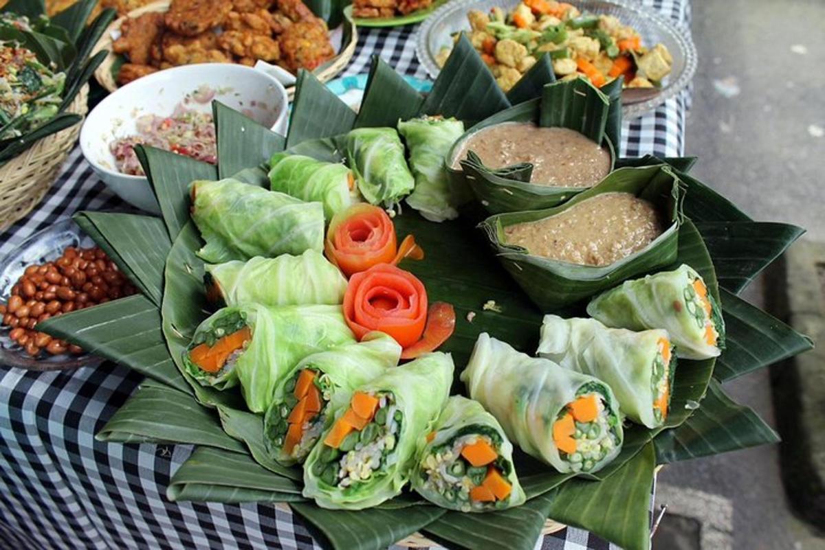 a plate of food with vegetables on a table