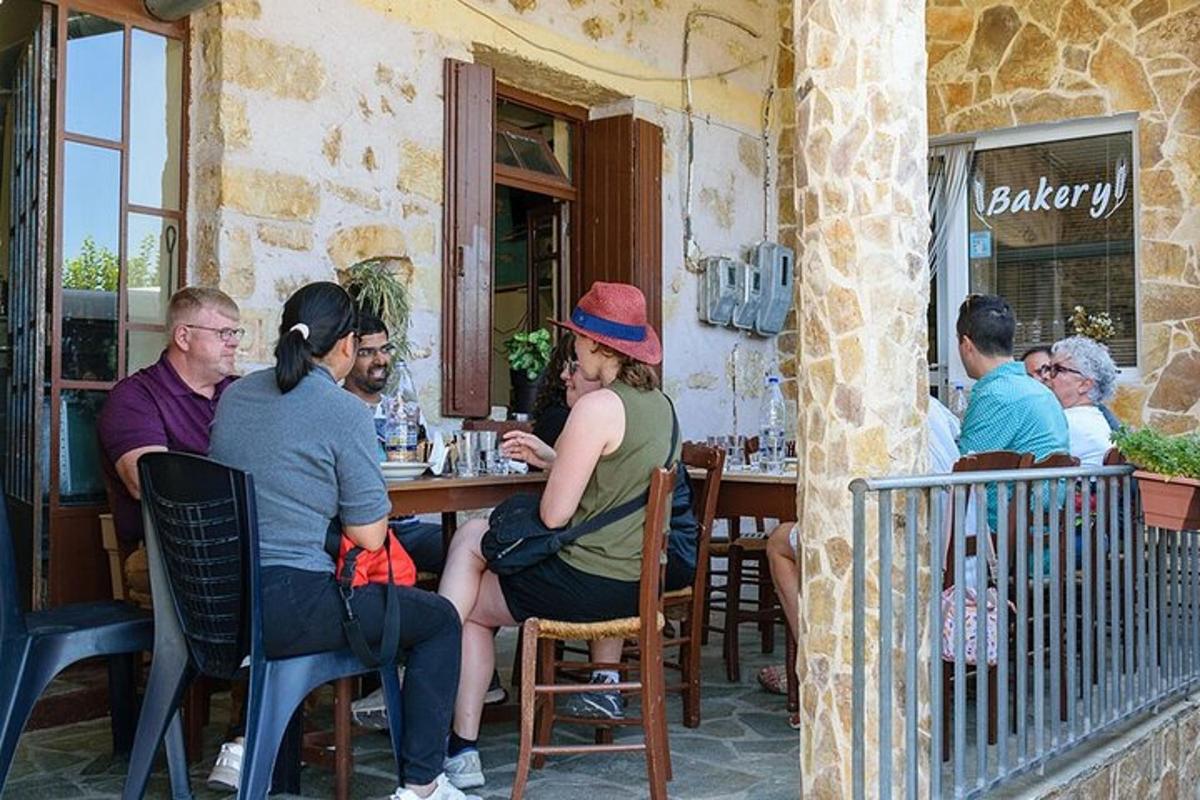 a group of people sitting at a table in a restaurant