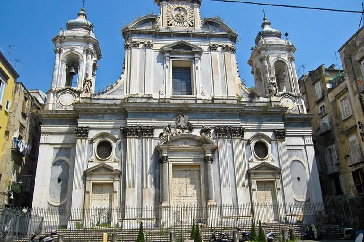 a large white church with a clock on top of it
