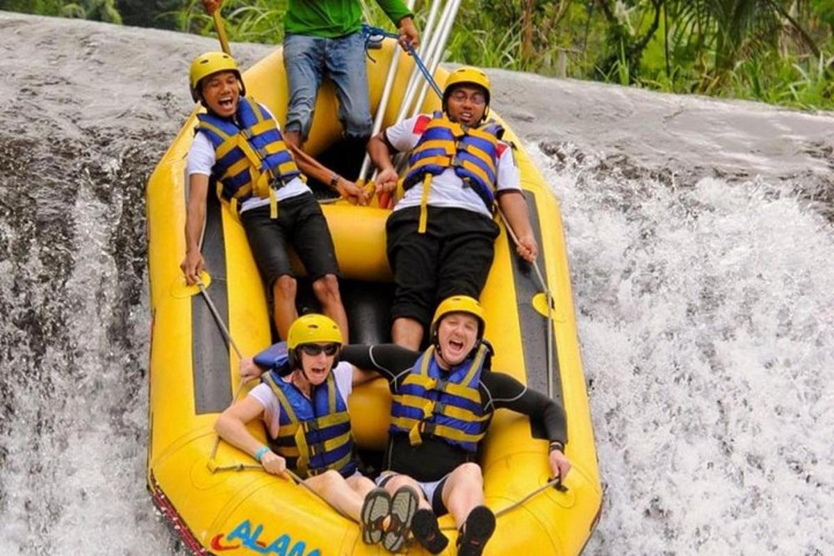 a group of men in yellow helmets on a raft