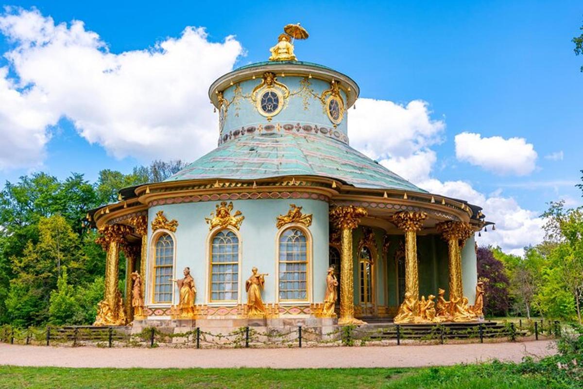 a large building with a dome in a park