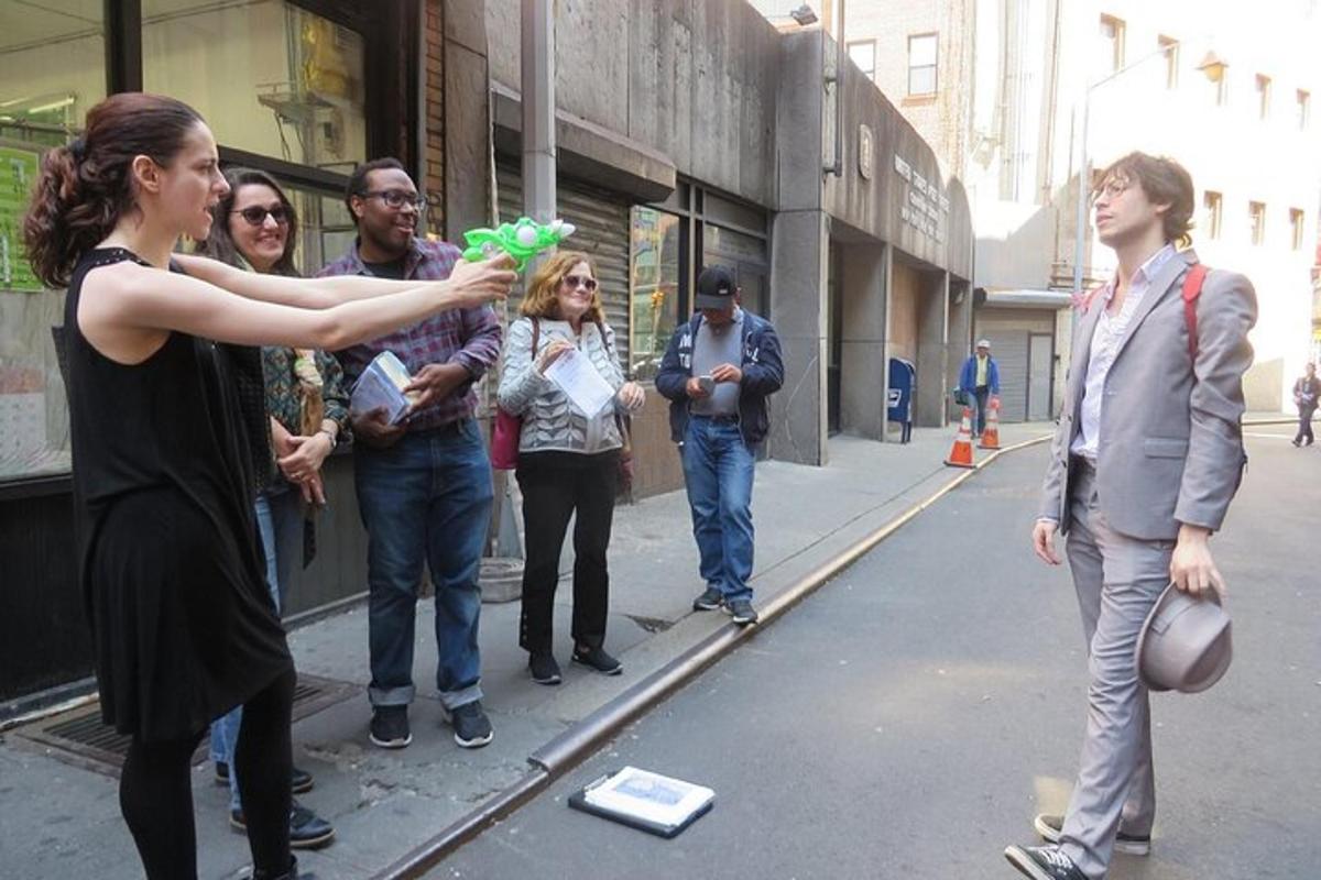 a woman standing in the street holding a green flower