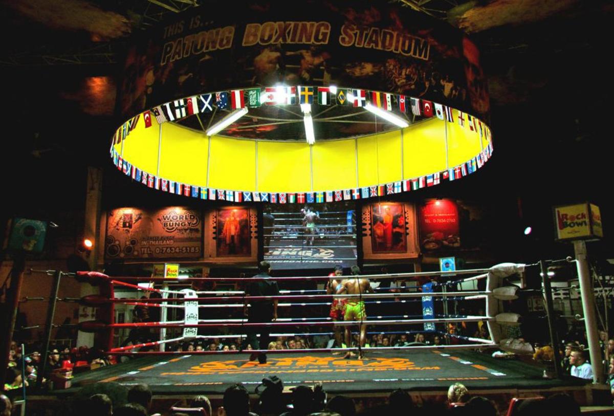 a person in a boxing ring in a circus