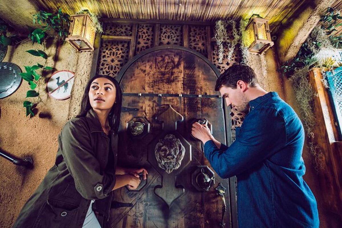 a man and a woman standing in front of a machine