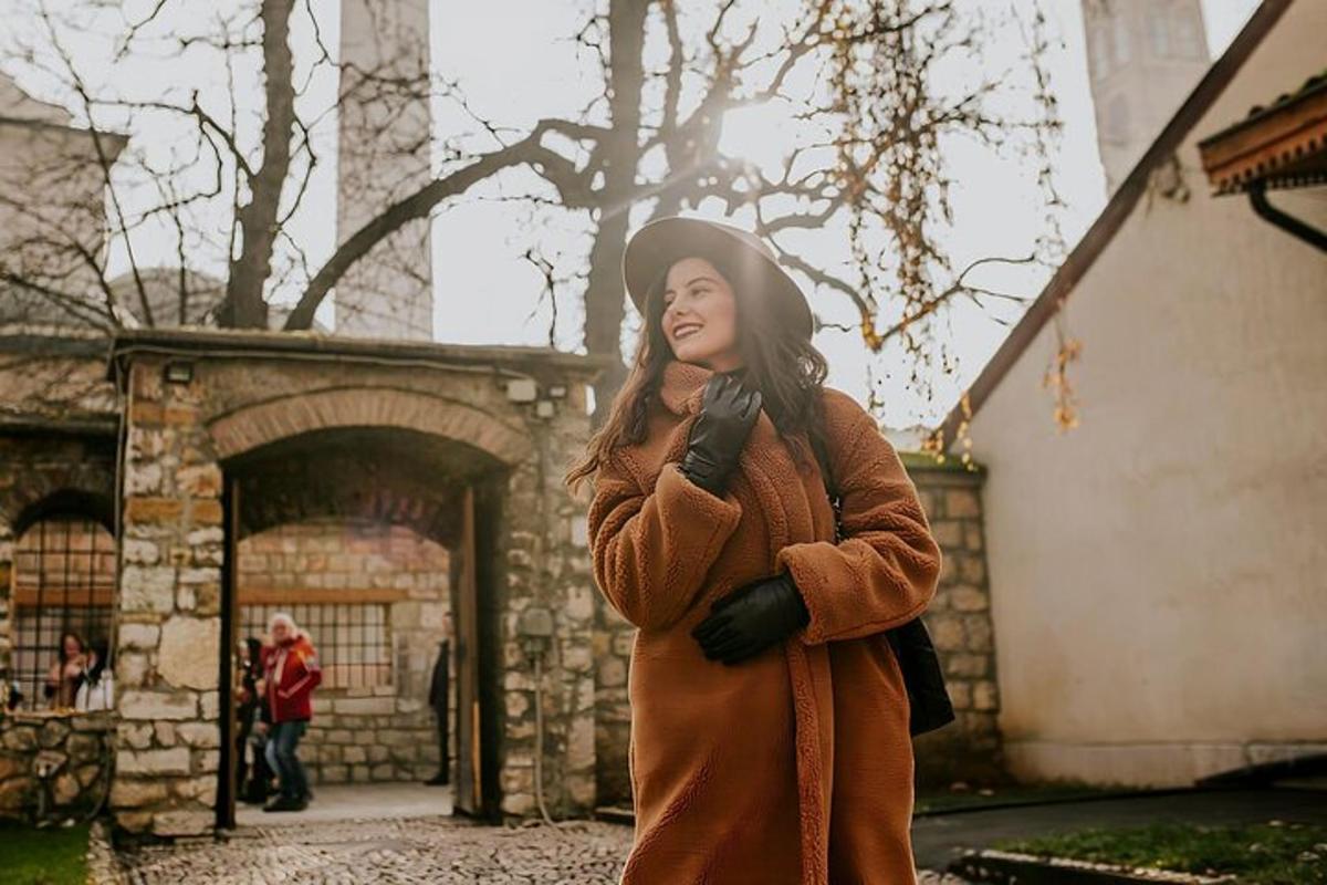 a woman is standing outside of a building