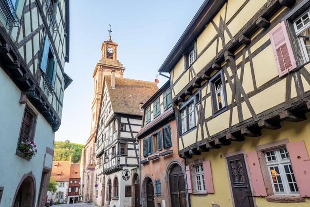 a group of buildings with a clock tower