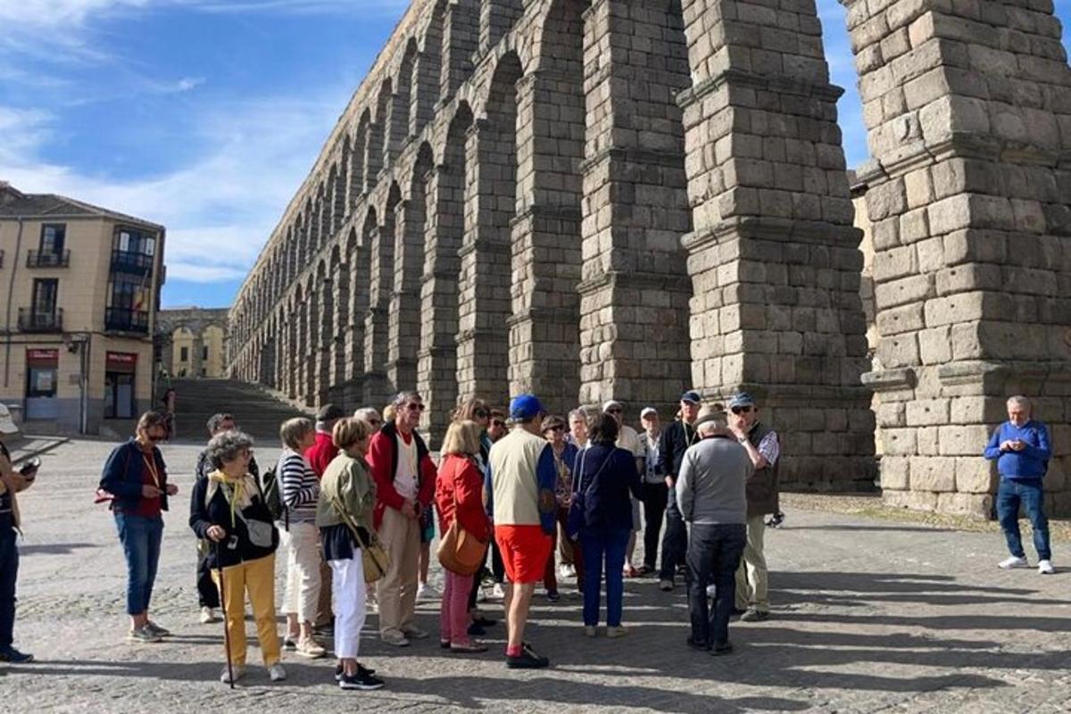 a group of people standing outside of a building