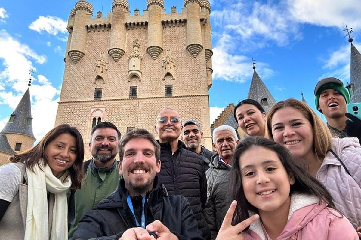 a group of people standing in front of a castle