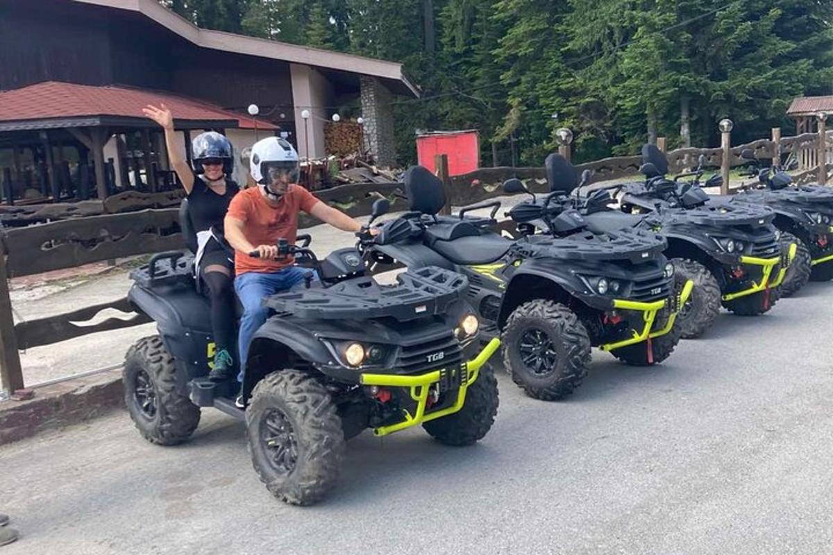 a group of people riding atvs on the road
