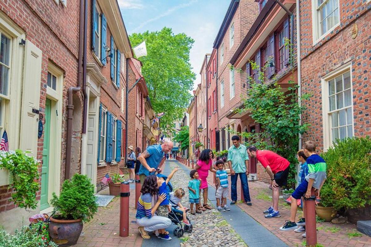 a group of children playing in a street with buildings