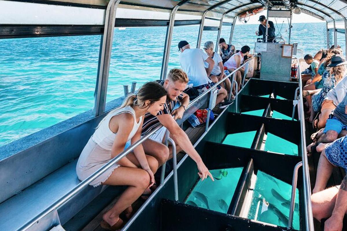 a group of people on a boat in the water