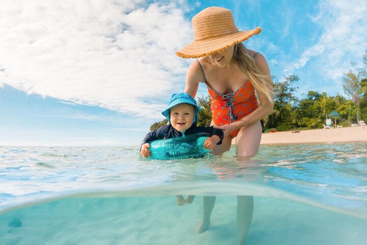 a woman and a child in the water