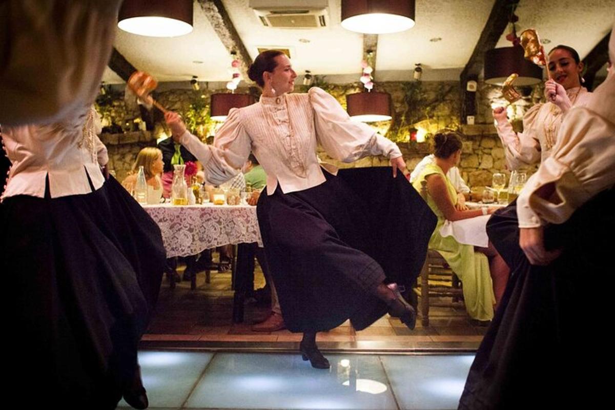 a group of people dancing in a restaurant