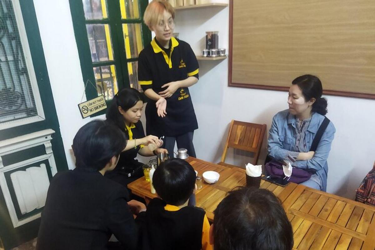 a group of people sitting around a table