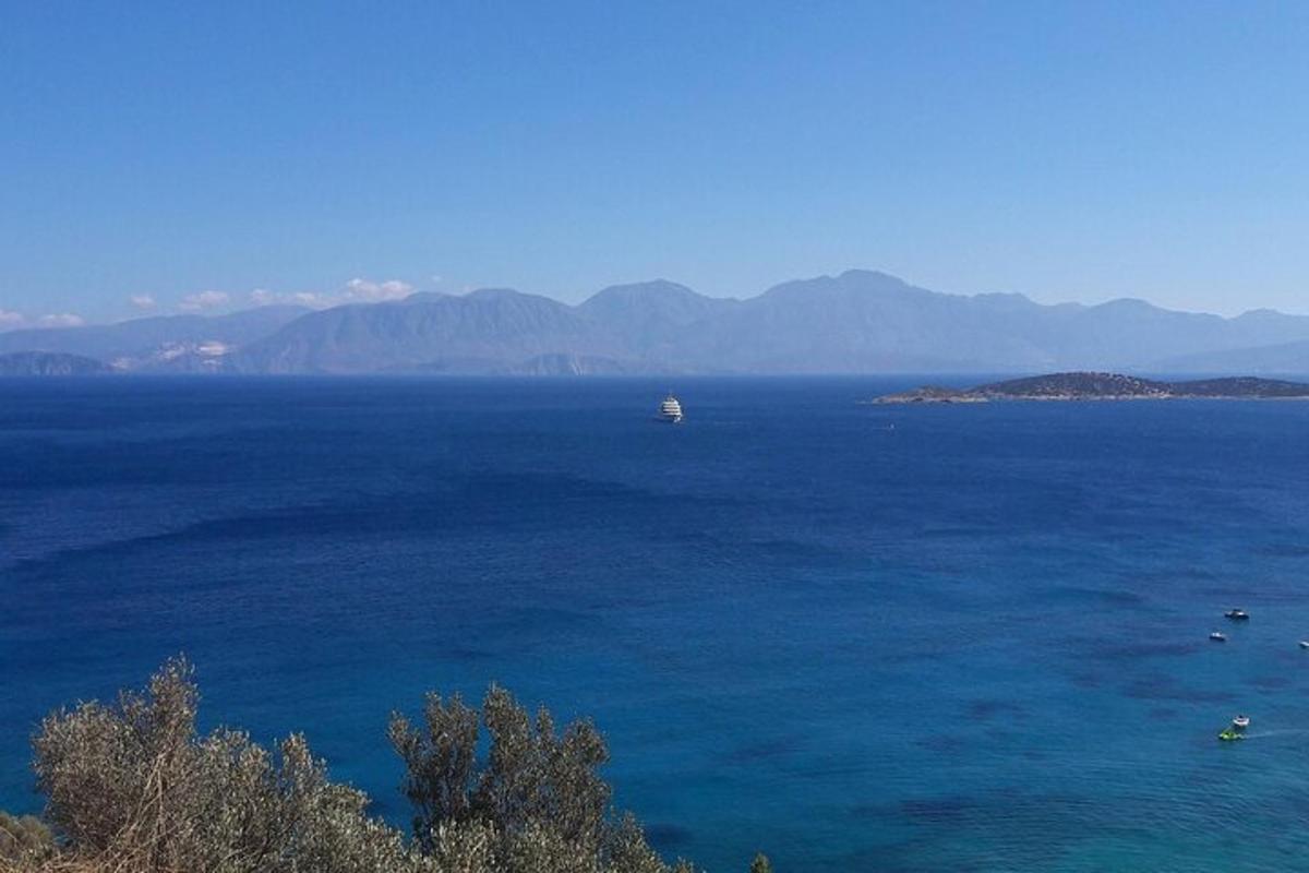 a large body of water with a boat in it