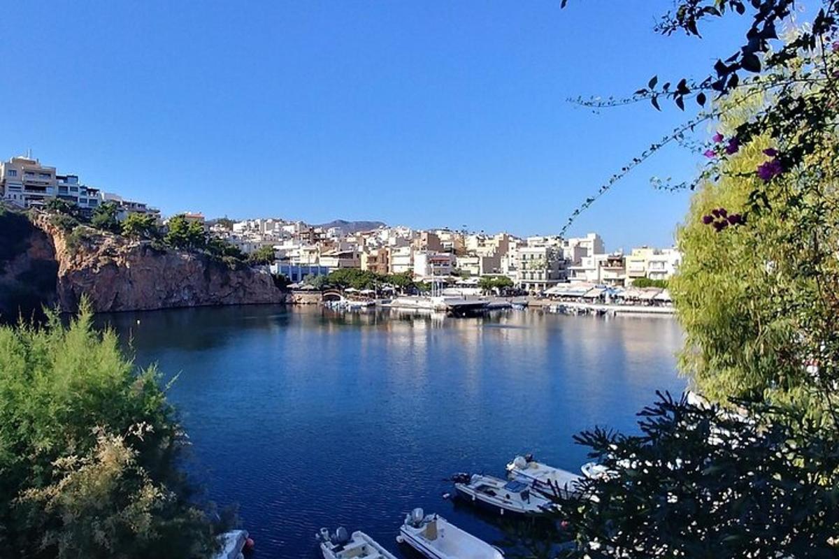 a view of a river with boats in a city