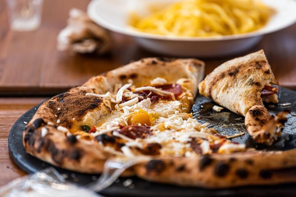 two slices of pizza on a plate on a table