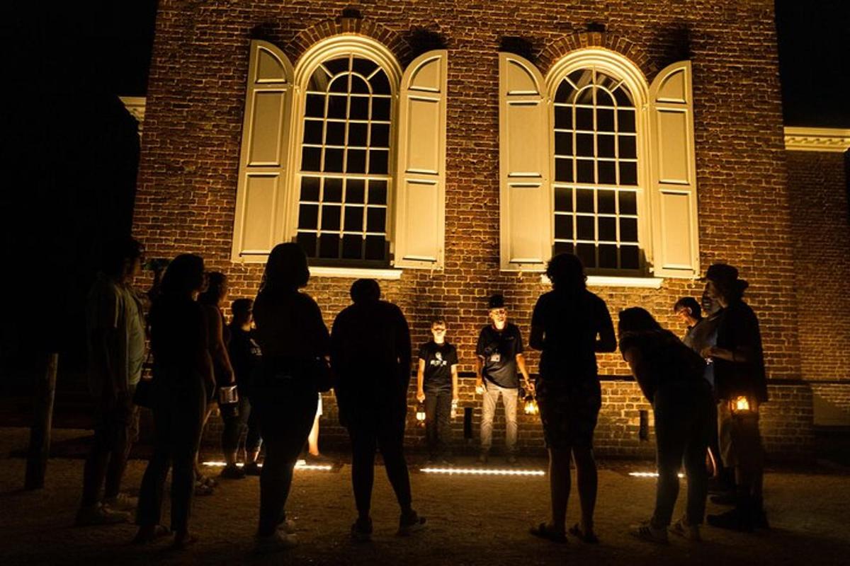a group of people standing in front of a building
