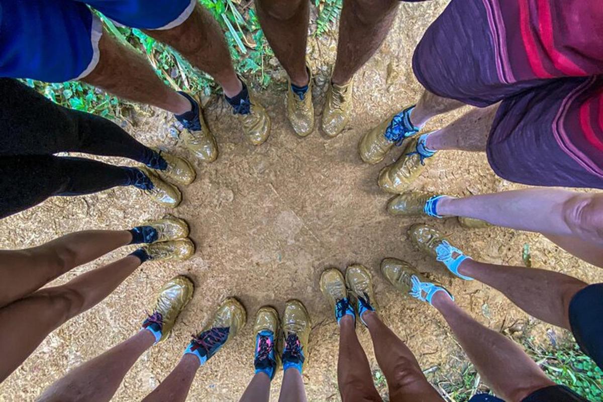 a group of people with painted nails and their hands in a circle