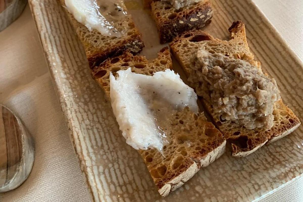 a sandwich with cheese on it on a plate