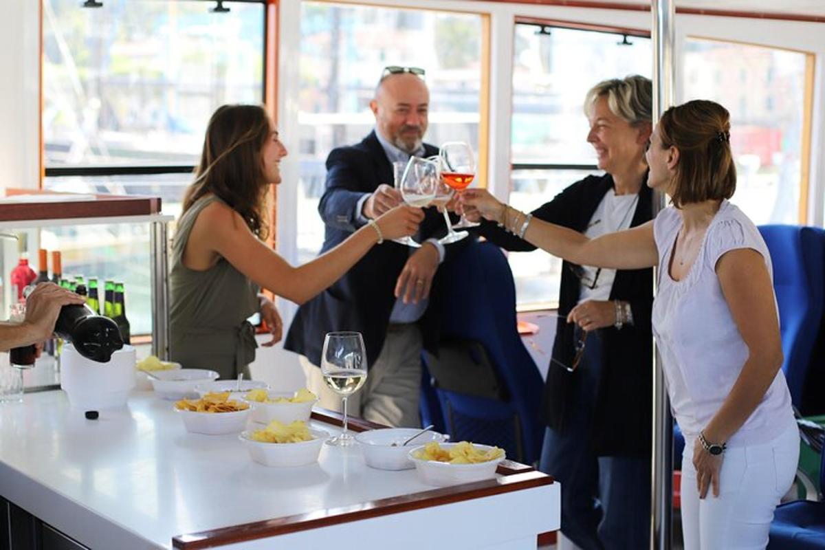 a group of people holding up glasses of wine