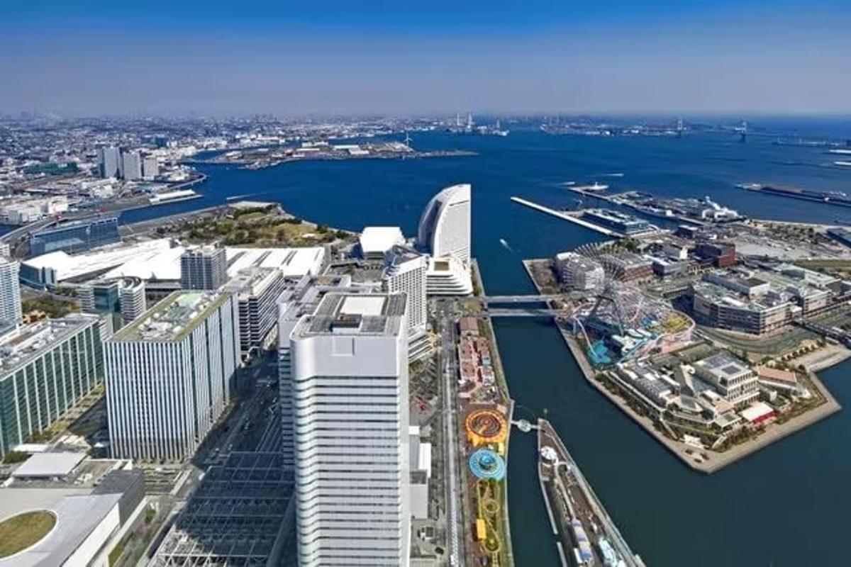 an aerial view of a city with a harbor