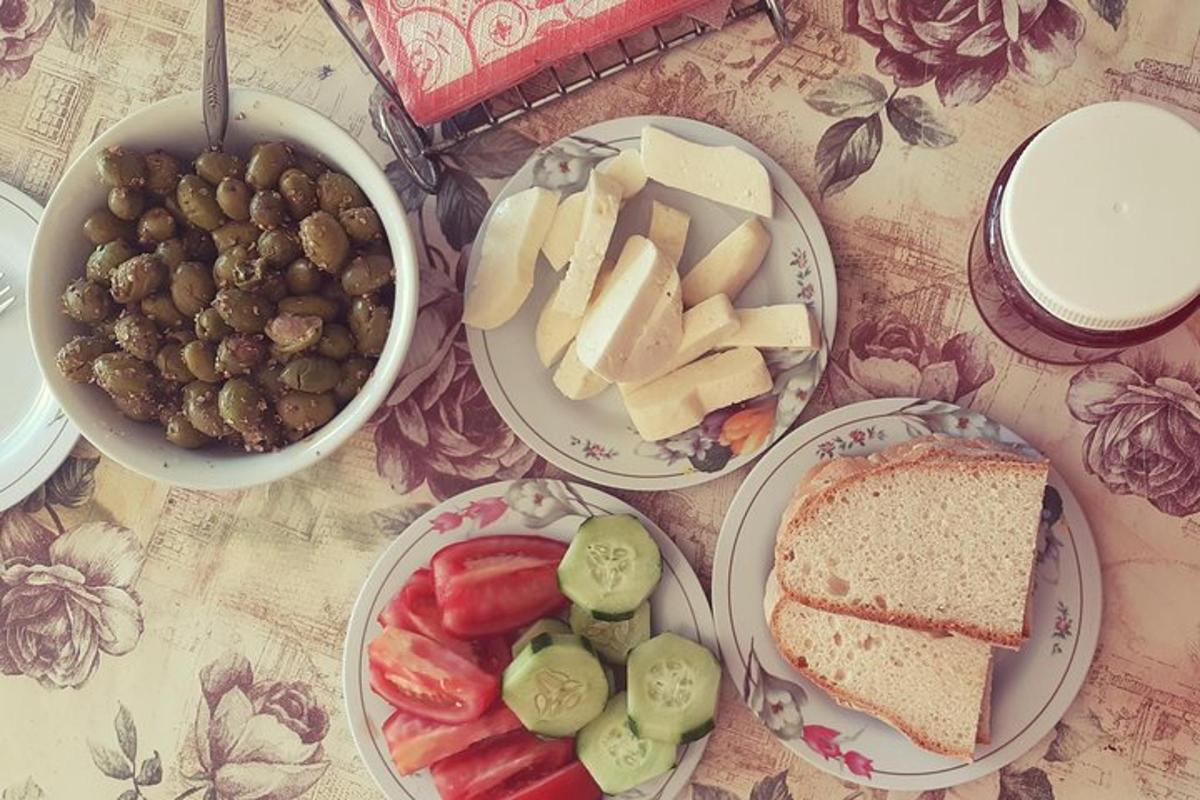 a table with plates of food on a table