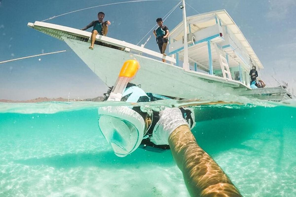 a pipe sticking out of a boat in the water