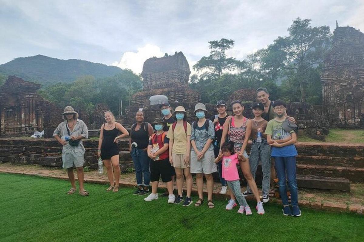 a group of people standing in front of a temple