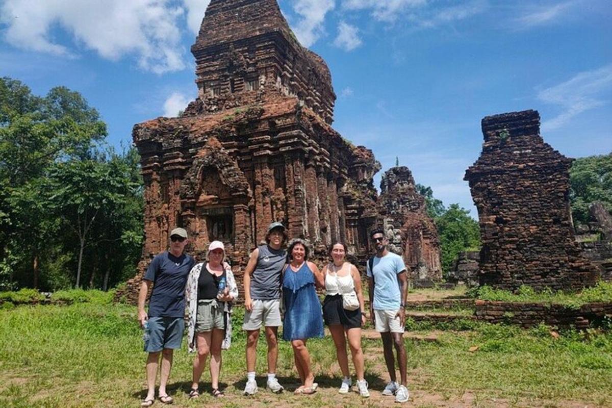 a group of people standing in front of a temple