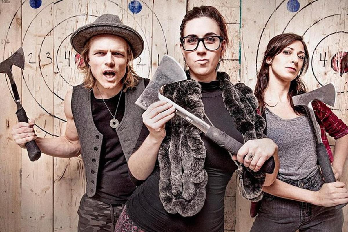 a group of three people holding knives andweapons