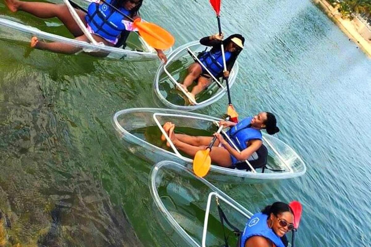 a group of people in boats in the water