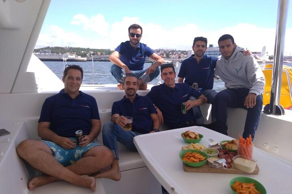 a group of men sitting on a boat