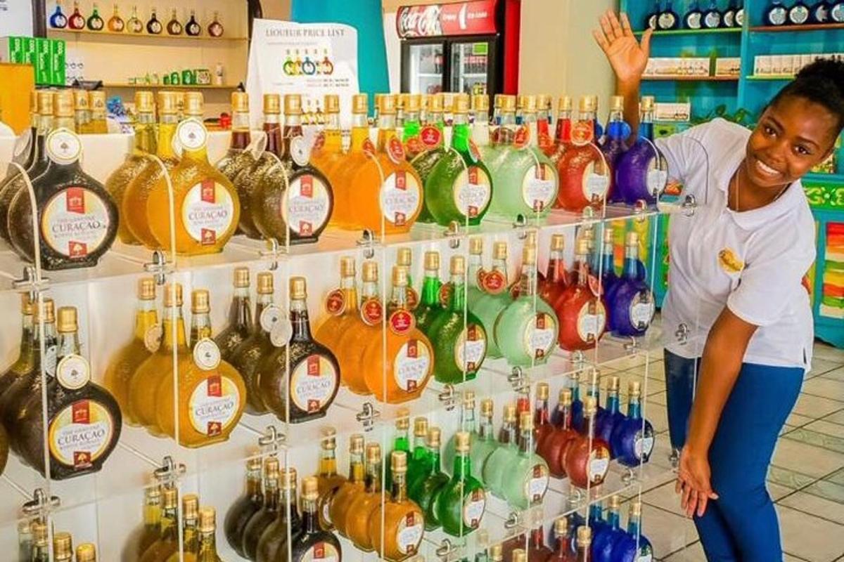 a woman standing in front of a display of wine bottles