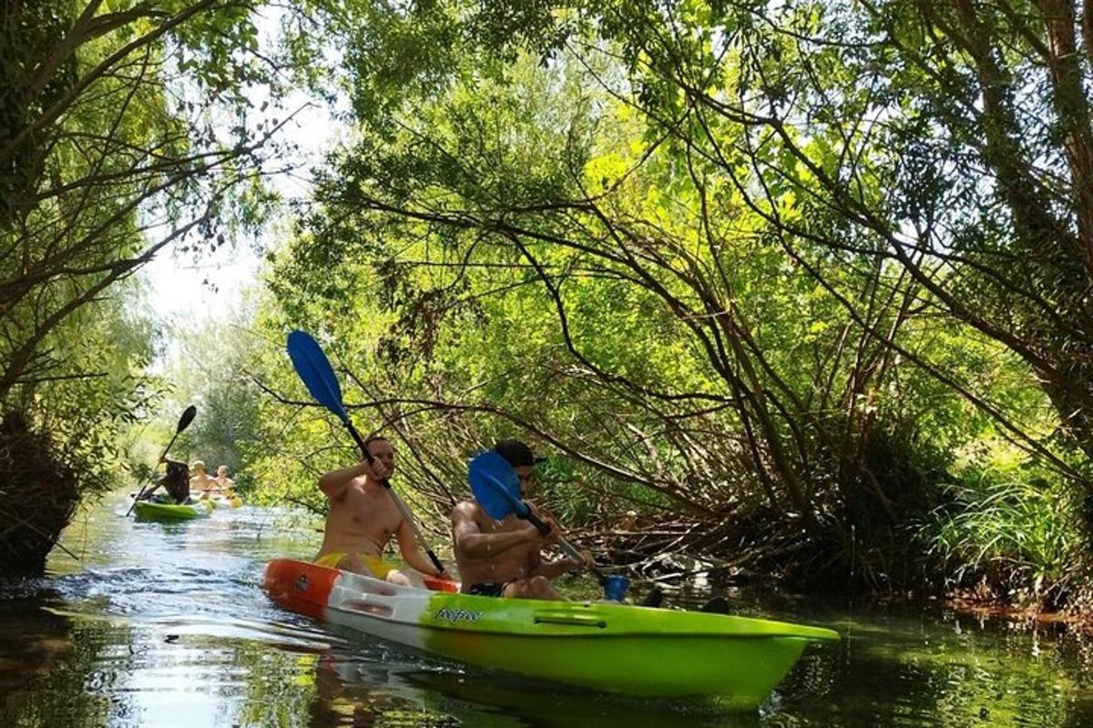 two men in a boat on a river