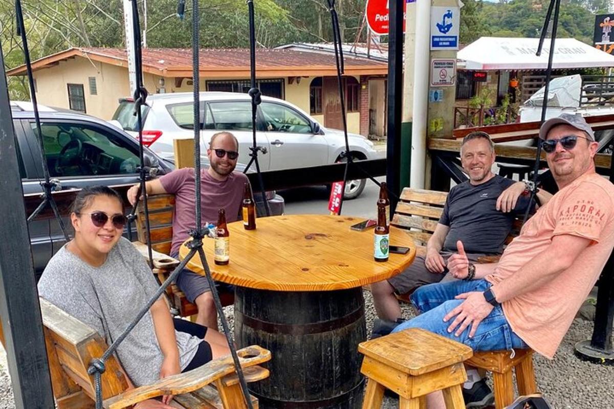a group of people sitting around a wooden table
