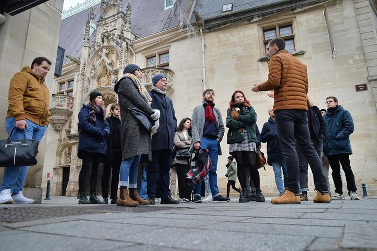 a group of people standing in front of a building