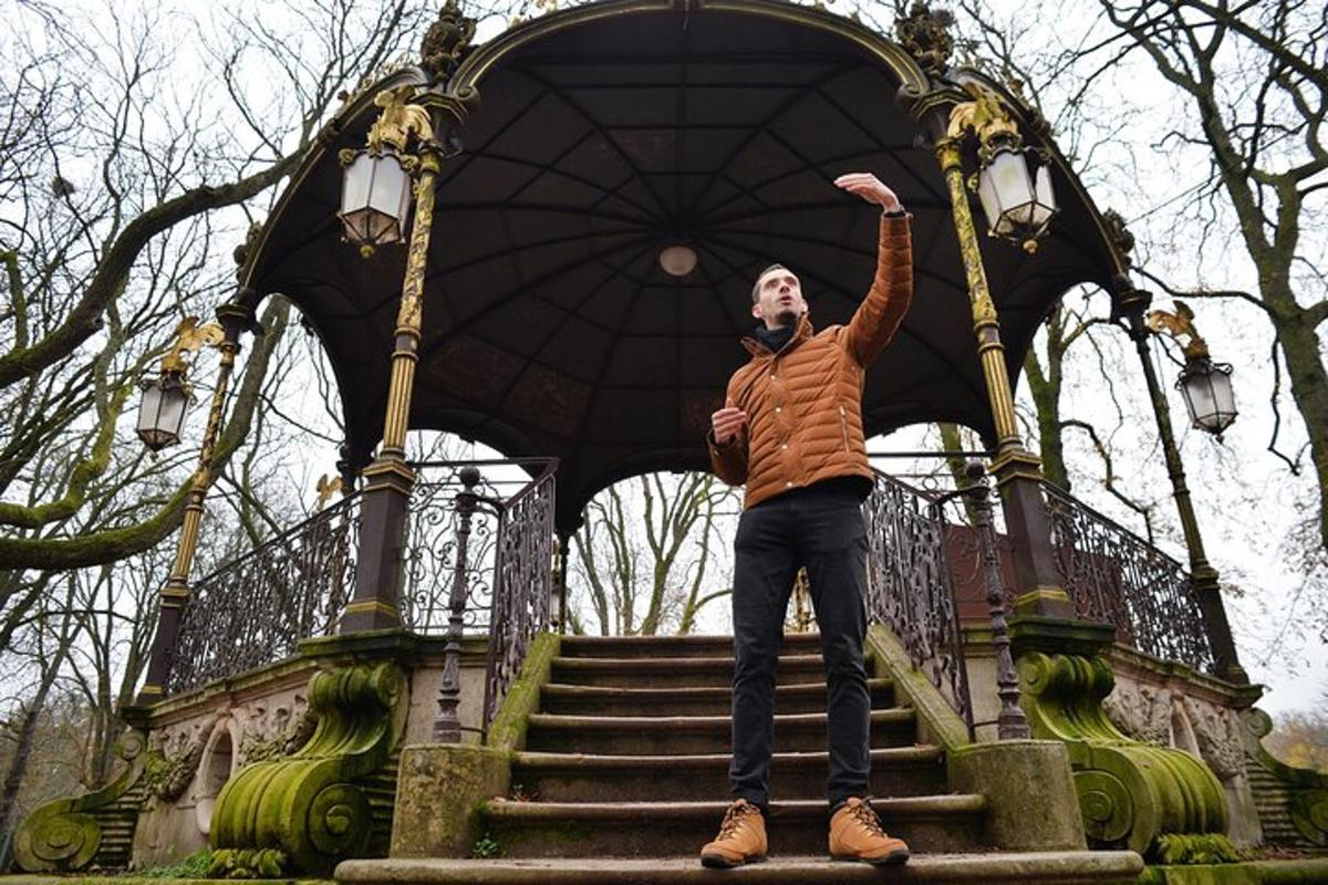 a man standing on steps in front of a building
