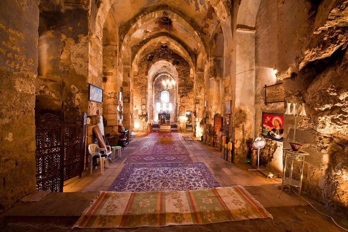 a large room with a large rug in a building