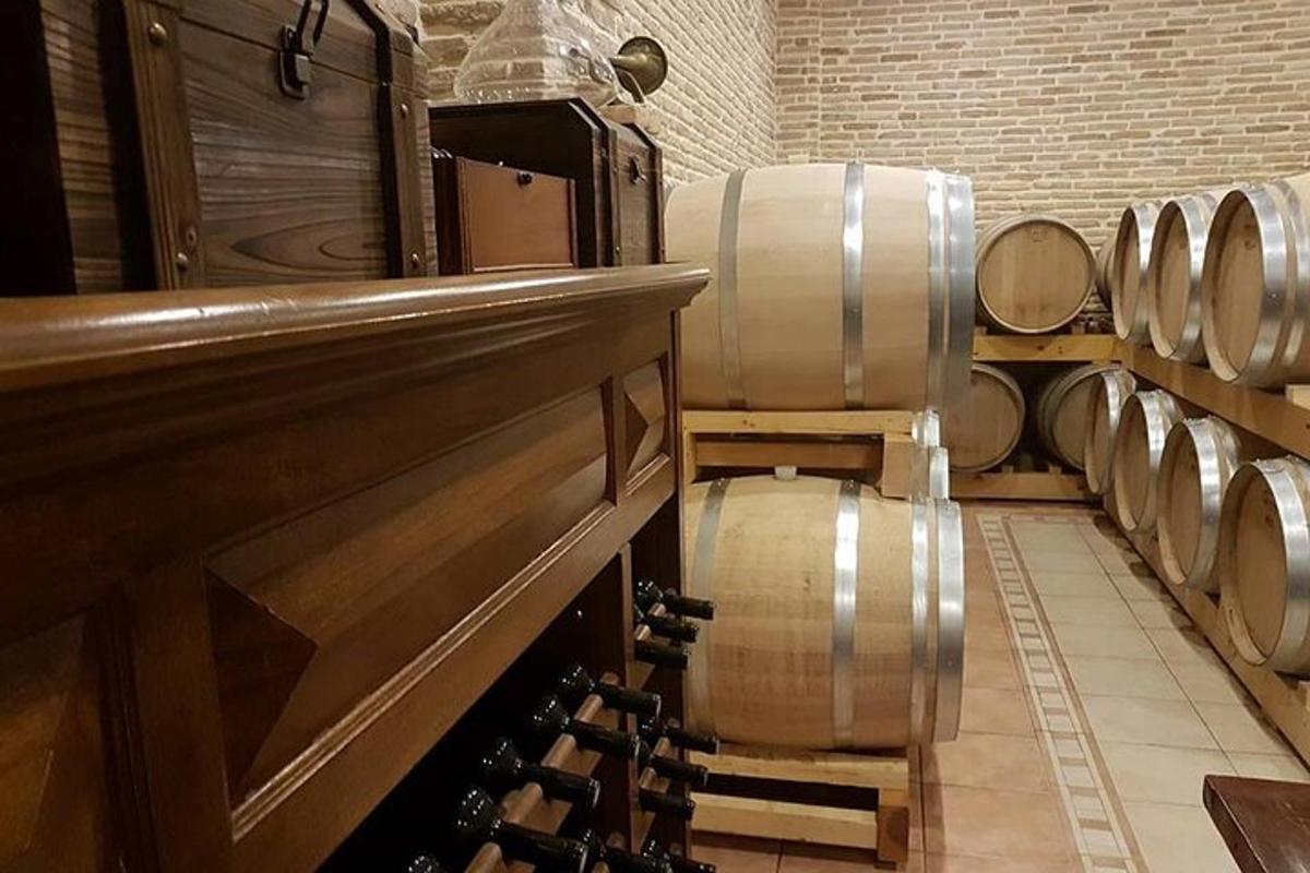 a wine cellar with a bunch of wine barrels