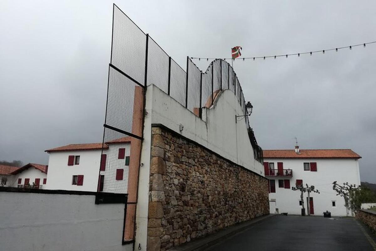 a fence on the side of a building
