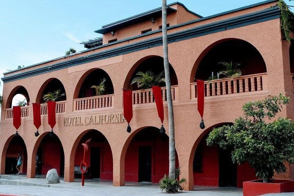 a building with red ribbons in front of it