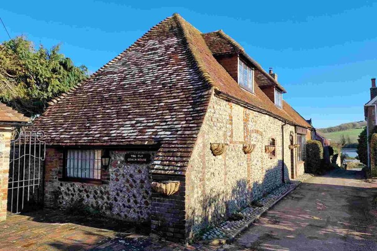 an old stone building with adding